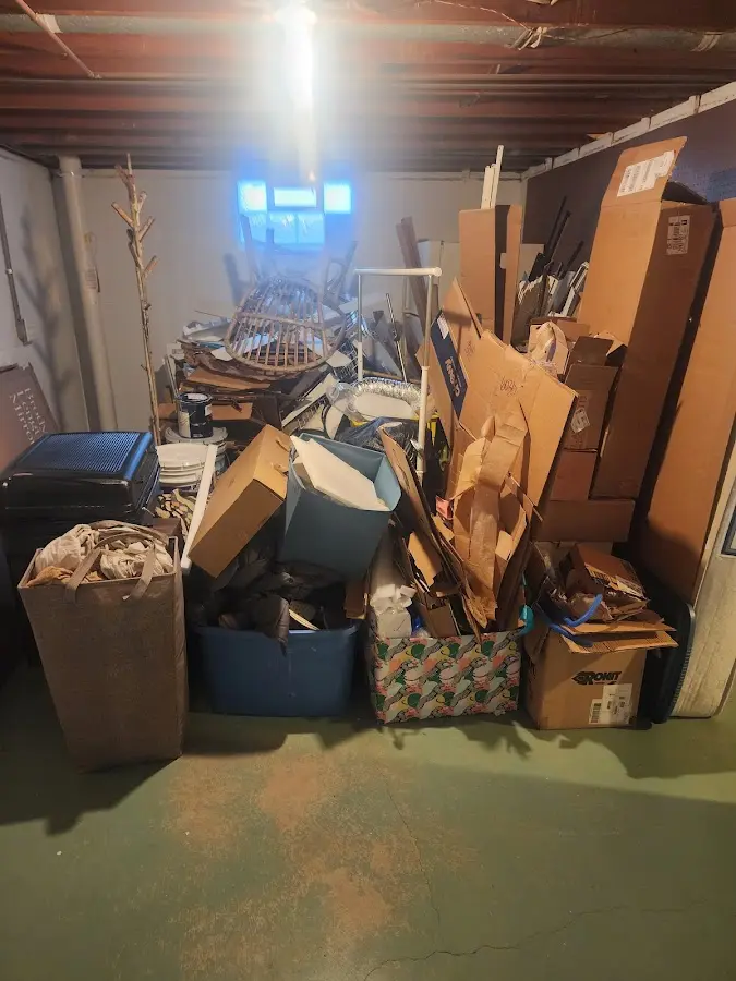 Roll-off dumpster container at job site for 4 Yard Dumpster Rental in Foster